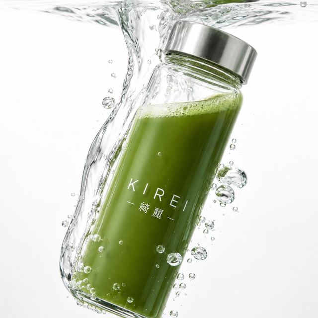 KIREI glass bottle filled with vibrant green matcha in clear water